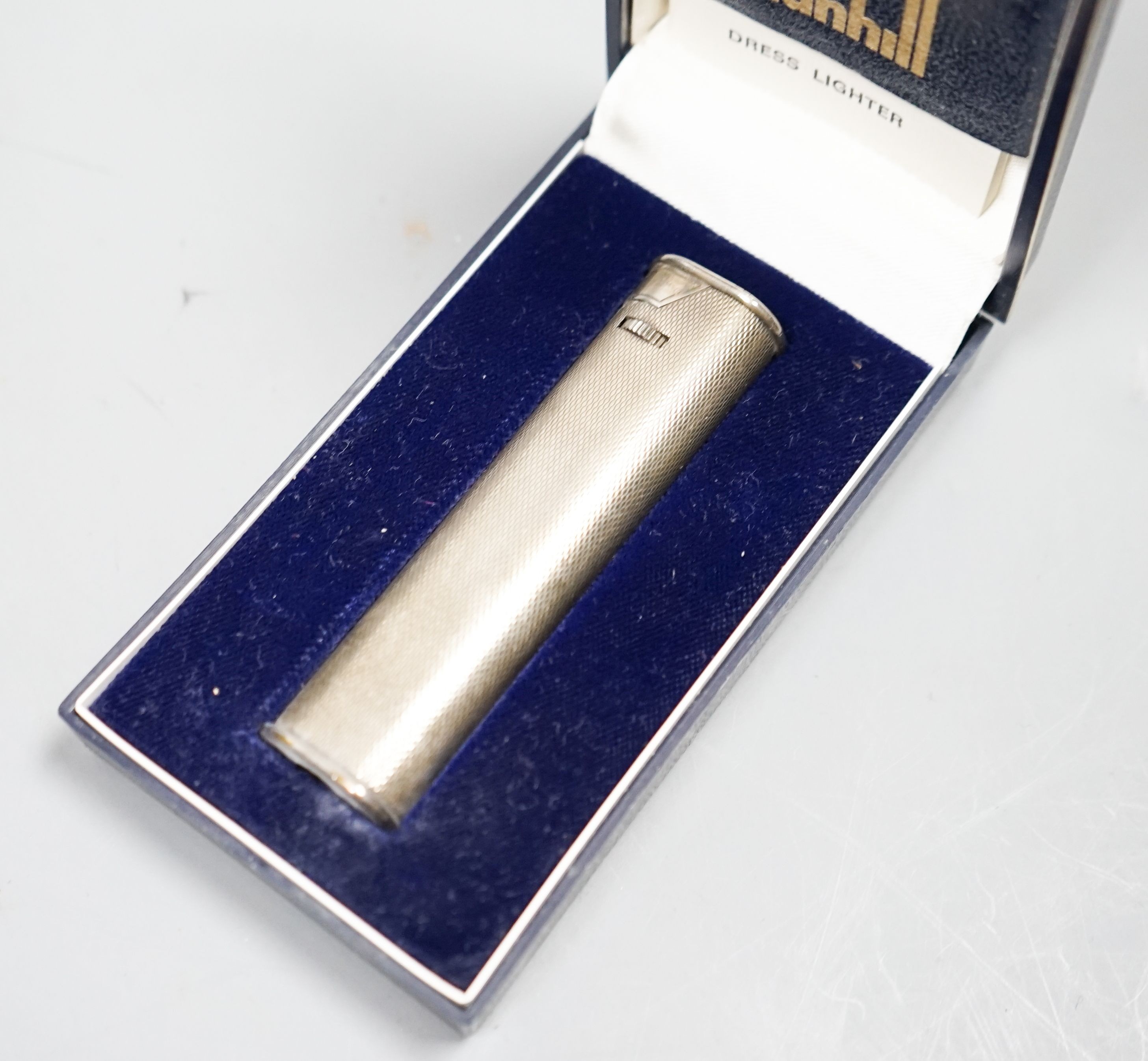 A Dunhill cigarette lighter, in case
